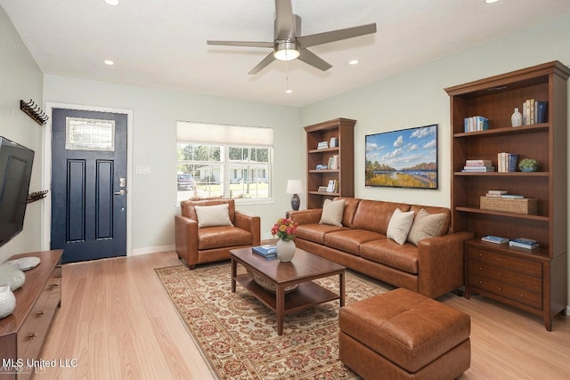 209 Audrey Cir, Ocean Springs, MS 39564 - living room featuring light wood-style floors, a ceiling fan, recessed lighting, and baseboards
