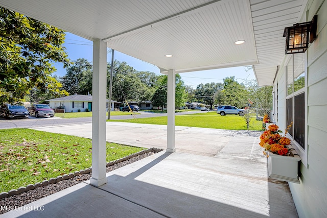 209 Audrey Cir, Ocean Springs, MS 39564 - covered porch with a yard