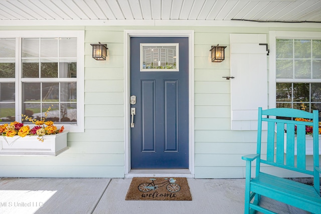 209 Audrey Cir, Ocean Springs, MS 39564 - view of exterior entry with a porch