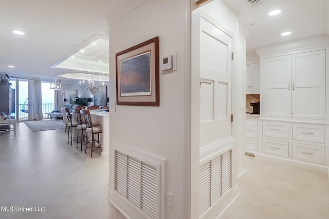 2668 Beach Blvd Unit 1704, Biloxi, MS 39531 - hallway with recessed lighting, light tile patterned floors, and a chandelier