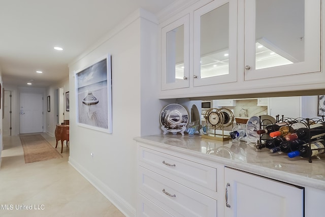 2668 Beach Blvd Unit 1704, Biloxi, MS 39531 - bar area featuring light tile patterned floors, recessed lighting, and baseboards