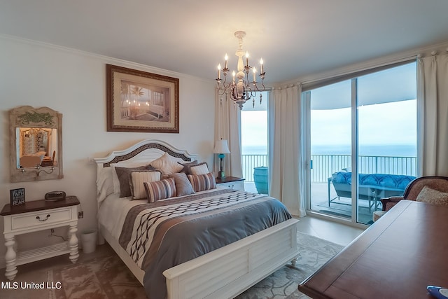 2668 Beach Blvd Unit 1704, Biloxi, MS 39531 - bedroom with a chandelier, access to outside, crown molding, and a water view