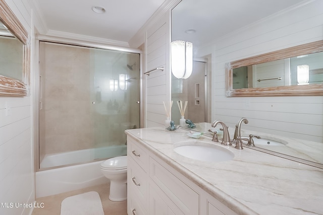 2668 Beach Blvd Unit 1704, Biloxi, MS 39531 - full bath with crown molding, toilet, vanity, and combined bath / shower with glass door