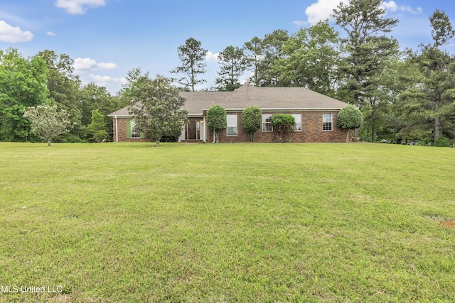 700 Martin Luther King Jr Dr, Holly Springs, MS 38635 - single story home featuring brick siding and a front yard
