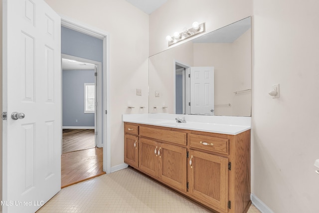 700 Martin Luther King Jr Dr, Holly Springs, MS 38635 - bathroom with vanity, baseboards, and tile patterned flooring
