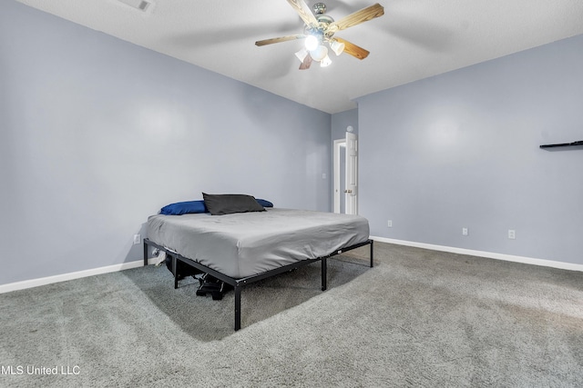 700 Martin Luther King Jr Dr, Holly Springs, MS 38635 - carpeted bedroom featuring baseboards and a ceiling fan
