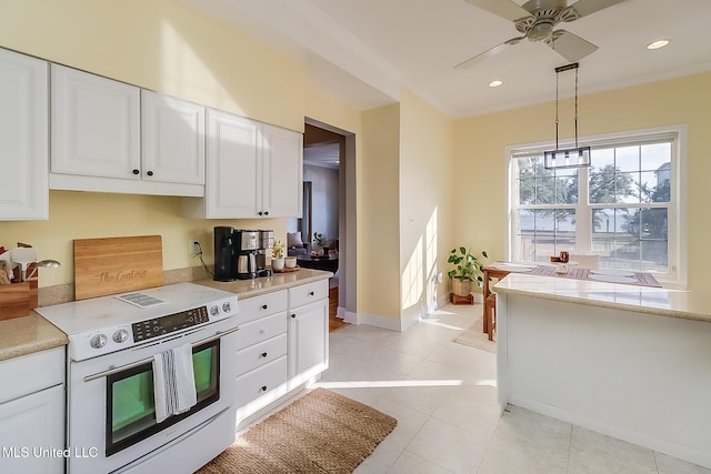 kitchen featuring light tile patterned floors, pendant lighting, white cabinets, ceiling fan, and stainless steel electric stove