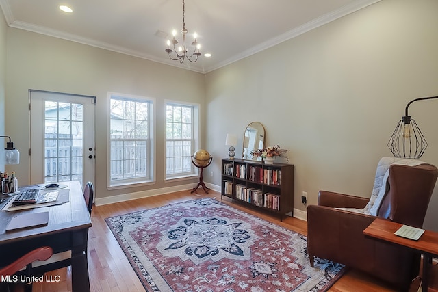 home office with a chandelier, wood-type flooring, and crown molding