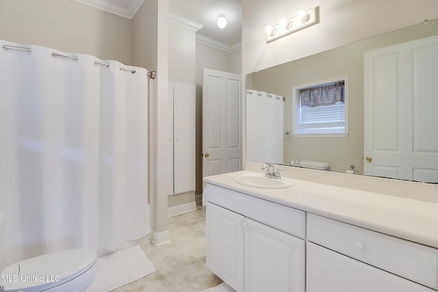 bathroom featuring tile patterned floors, vanity, toilet, and ornamental molding