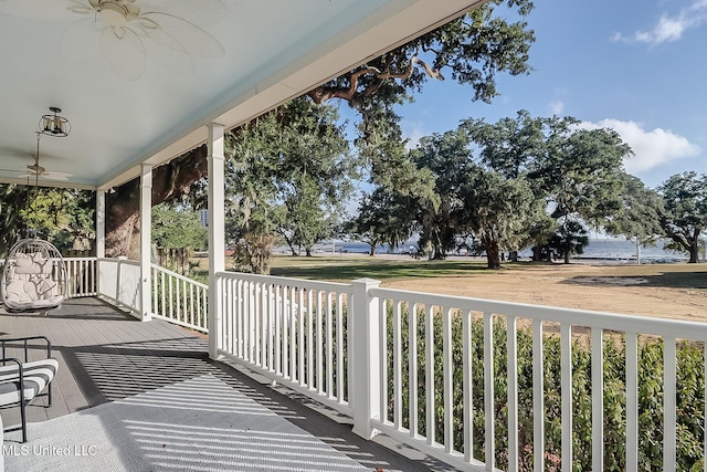 deck featuring ceiling fan and covered porch