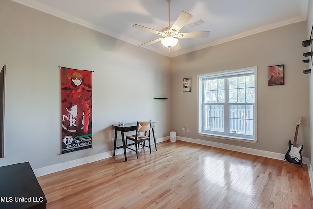 office area with ceiling fan, light hardwood / wood-style floors, and crown molding