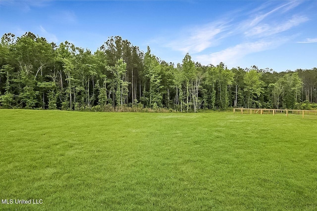 1622 Old Lake Rd, Brandon, MS 39042 - view of grassy yard featuring a forest view