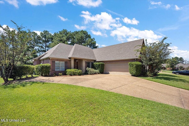 single story home featuring a garage and a front lawn