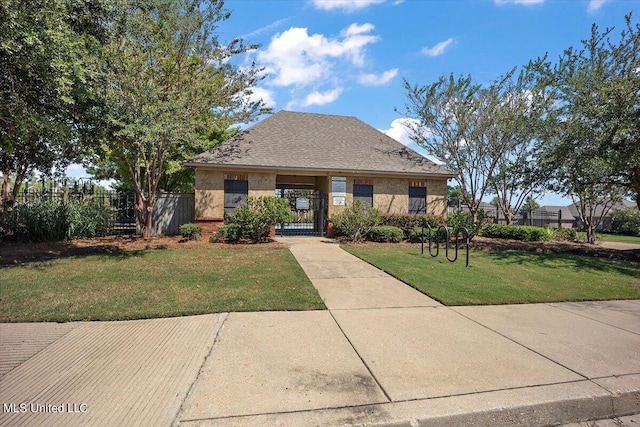 view of front of house with a front lawn