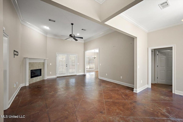 unfurnished living room with french doors, ornamental molding, a high ceiling, and ceiling fan