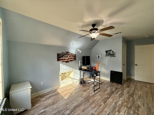 office featuring vaulted ceiling, wood finished floors, a ceiling fan, and baseboards