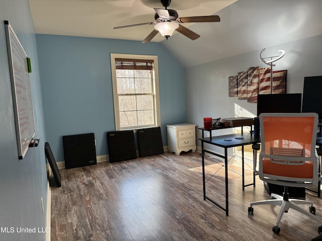 office space featuring lofted ceiling, ceiling fan, wood finished floors, and baseboards