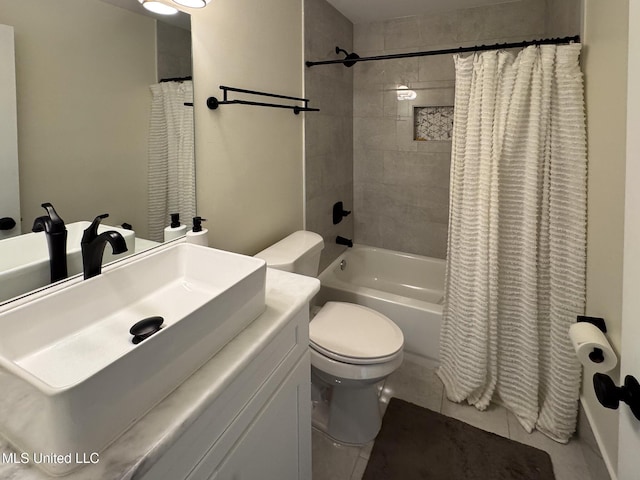 full bathroom with toilet, shower / bath combination with curtain, vanity, and tile patterned floors