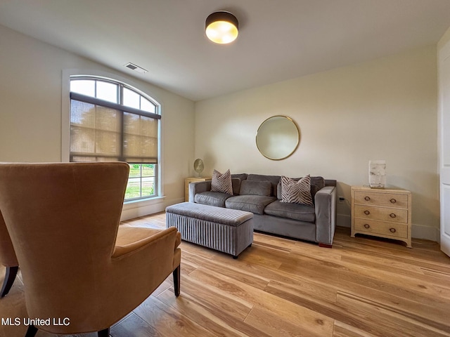 living area with light wood-style floors