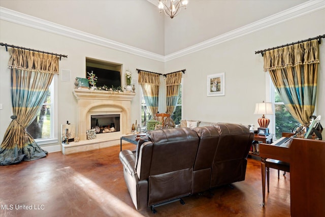 living room with a towering ceiling and crown molding