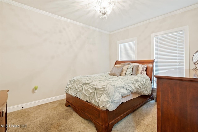 carpeted bedroom featuring crown molding and a notable chandelier