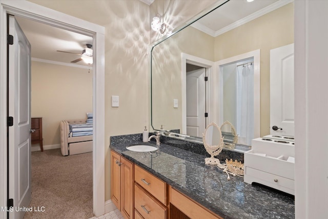 bathroom with vanity, crown molding, and ceiling fan