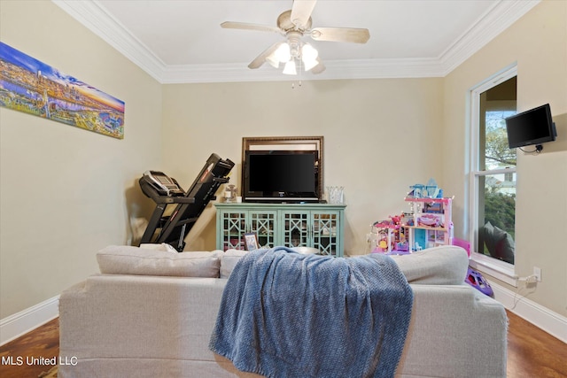 living room with crown molding, dark hardwood / wood-style floors, and ceiling fan