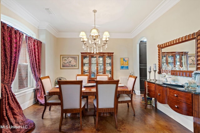 815 Warren St, Pascagoula, MS 39567 - dining area with concrete flooring, a chandelier, baseboards, ornamental molding, and plenty of natural light