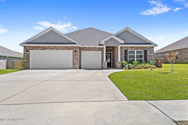 15380 Woodmanse Way, Diberville, MS 39540 - view of front of property featuring a garage, driveway, and brick siding