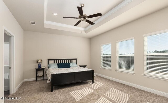 15380 Woodmanse Way, Diberville, MS 39540 - carpeted bedroom featuring a tray ceiling, baseboards, crown molding, recessed lighting, and ceiling fan