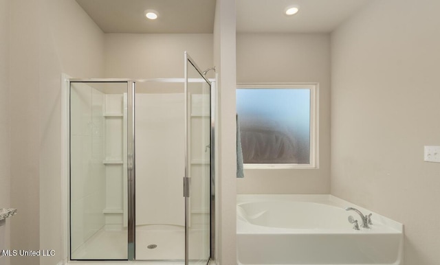 15380 Woodmanse Way, Diberville, MS 39540 - bathroom with a bath, a shower stall, and recessed lighting