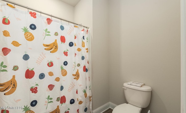 15380 Woodmanse Way, Diberville, MS 39540 - full bath with baseboards, toilet, and a shower with curtain