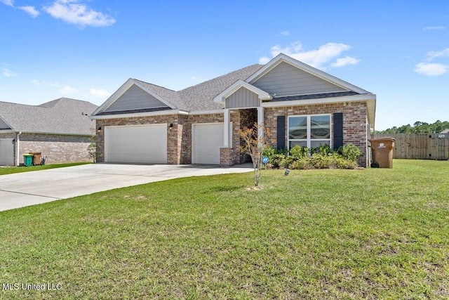 15380 Woodmanse Way, Diberville, MS 39540 - view of front of home featuring an attached garage, brick siding, driveway, and a shingled roof