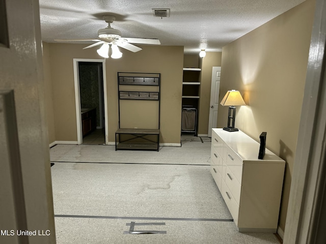 unfurnished bedroom with a textured ceiling