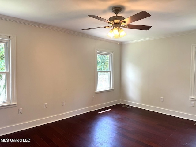 1708 Robinson St, Natchez, MS 39120 - spare room with visible vents, dark wood-style flooring, and plenty of natural light