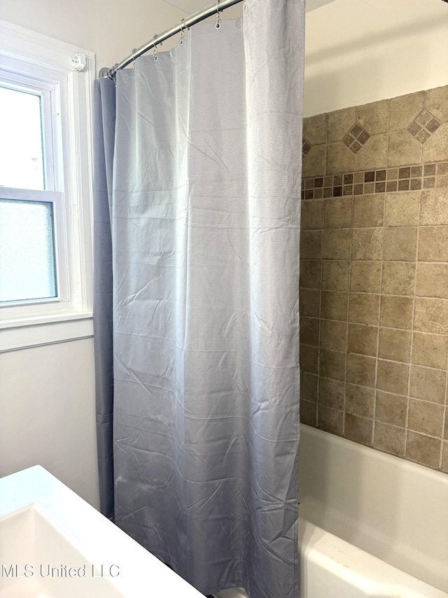 1708 Robinson St, Natchez, MS 39120 - bathroom with shower / bath combination with curtain