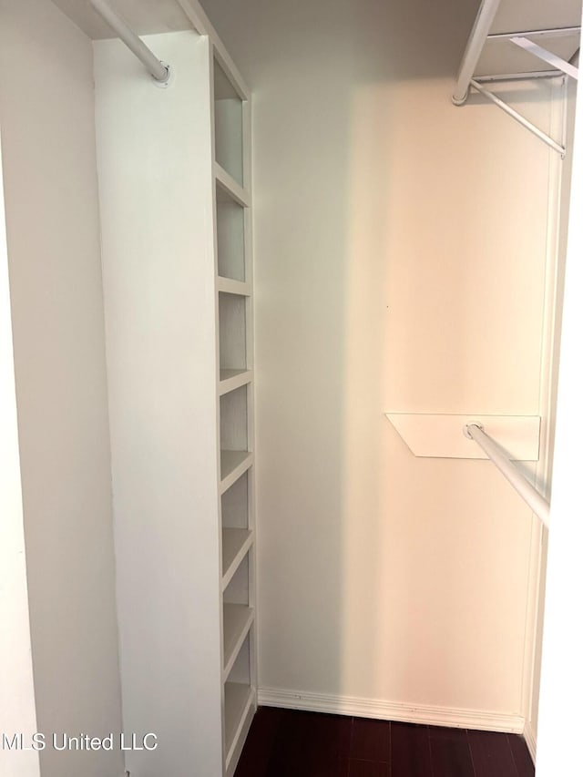 1708 Robinson St, Natchez, MS 39120 - spacious closet featuring dark wood-style flooring
