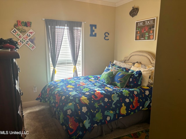 bedroom with crown molding and carpet flooring