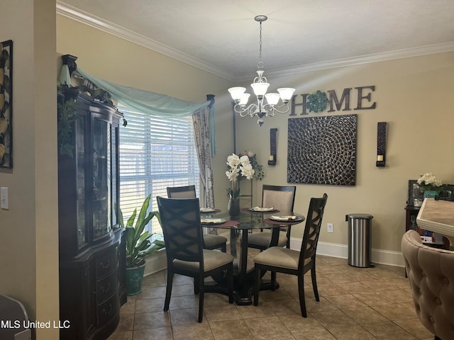 dining room featuring crown molding, a chandelier, and tile patterned floors