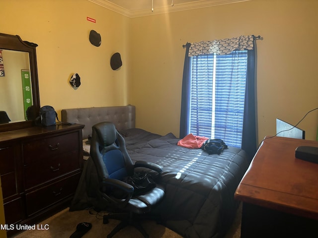 carpeted bedroom featuring crown molding