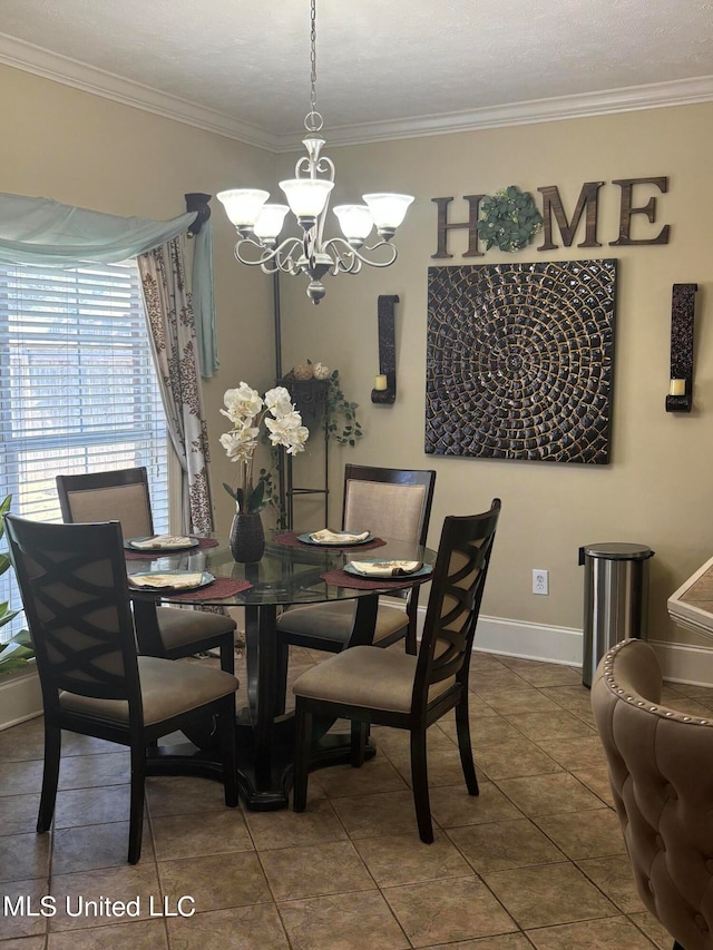 tiled dining space with an inviting chandelier and ornamental molding