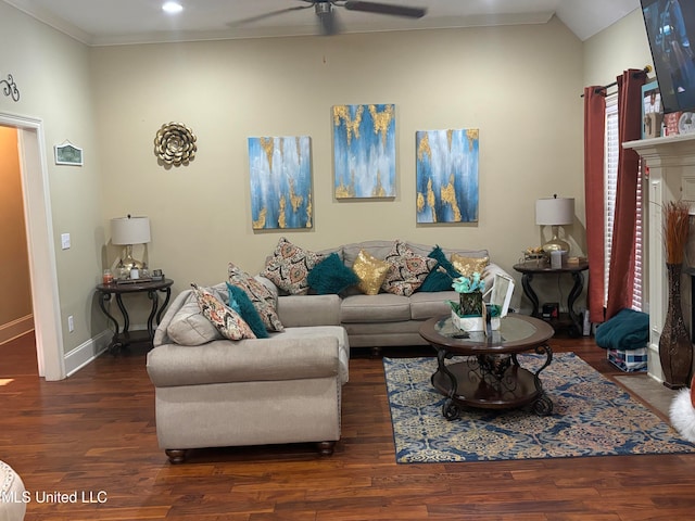 living room with crown molding, vaulted ceiling, ceiling fan, and dark hardwood / wood-style flooring