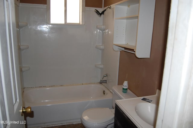 bathroom with shower / bathtub combination, toilet, and vanity