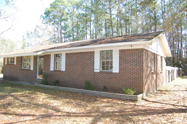 view of front of property with brick siding