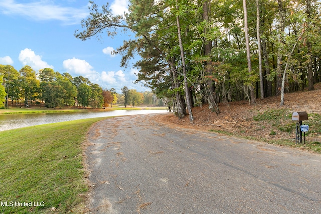 view of road featuring a water view