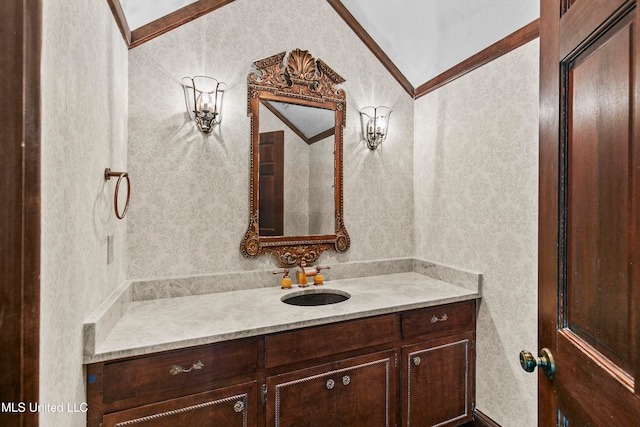 bathroom with vanity and ornamental molding