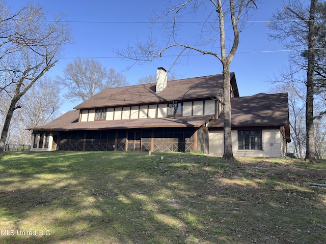 1609 SW Linda Dr, Clinton, MS 39056 - back of property with a chimney and a yard