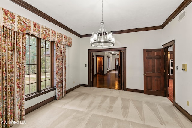 interior space featuring light carpet, a healthy amount of sunlight, and an inviting chandelier