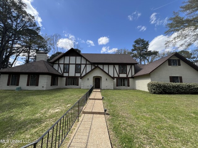 1609 SW Linda Dr, Clinton, MS 39056 - english style home featuring brick siding and a chimney
