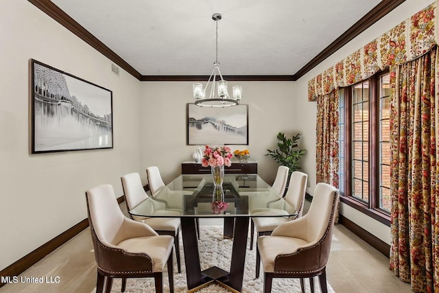 1609 SW Linda Dr, Clinton, MS 39056 - carpeted dining room featuring baseboards, a chandelier, and ornamental molding